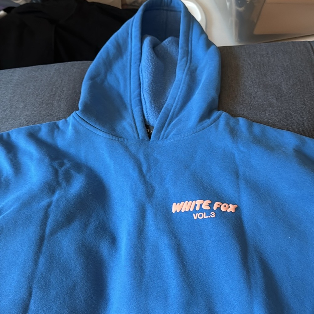 White Fox Hoodie in Azure Blue with Pink Logo and Graphic on Back. Size xxxs/xs.